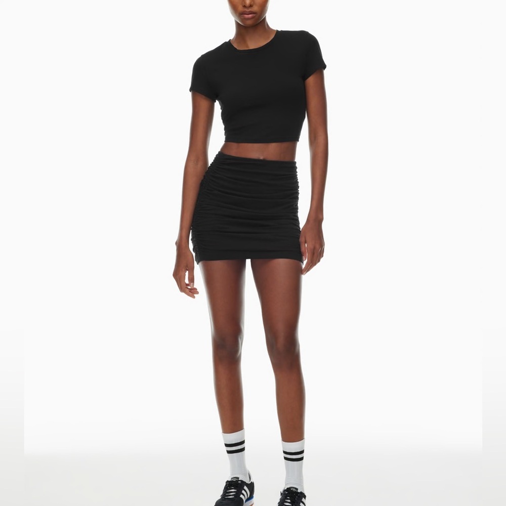 TNA white scrunch skirt from Aritzia